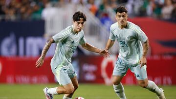Mexico's midfielder #10 Jordan Carrillo controls the ball during the International Friendly football match between Mexico and Bolivia at Soldier Field in Chicago, Illinois, May 31, 2024. (Photo by KAMIL KRZACZYNSKI / AFP)