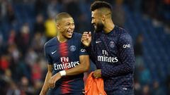 Paris Saint-Germain&#039;s French forward Kylian Mbappe (L) jokes with Paris Saint-Germain&#039;s Cameroonian forward Eric Choupo-Moting at the end of the French L1 football match between Paris Saint-Germain (PSG) and Amiens at the Parc des Princes stadiu