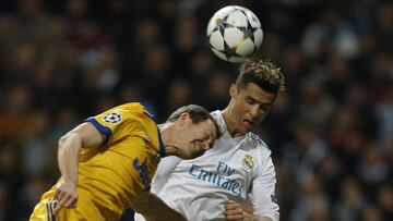 Juventus&#039; Daniele Rugani, left, is challenged by Real Madrid&#039;s Cristiano Ronaldo during a Champions League quarter-final, 2nd leg soccer match between Real Madrid and Juventus at the Santiago Bernabeu stadium in Madrid, Spain, Wednesday, April 1