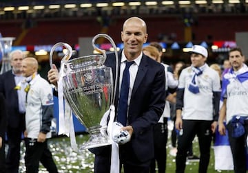 2017 | Real Madrid coach Zinedine Zidane celebrates with the trophy after winning the UEFA Champions League