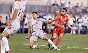 Bale fires into the net to make it 2-0.