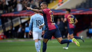 Barcelona's Brazilian forward #11 Raphinha celebrates scoring his team's third goal during the Spanish league football match between FC Barcelona and RC Celta de Vigo at the Estadi Olimpic Lluis Companys in Barcelona on April 19, 2025. (Photo by Josep LAGO / AFP)