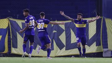 BUENOS AIRES, ARGENTINA - APRIL 27: Carlos Tevez of Boca Juniors celebrates with teammates after scoring the opening goal during a match between Boca Juniors and Santos as part of Group C of Copa CONMEBOL Libertadores 2021 at Estadio Alberto J. Armando on