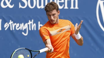 Pablo Carre&ntilde;o ejecuta un drive ante Lajovic.