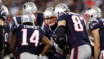 FOXBOROUGH, MA - JANUARY 13: Tom Brady #12 of the New England Patriots reacts in the huddle with Brandin Cooks #14 and Rob Gronkowski #87 during the fourth quarter in the AFC Divisional Playoff game against the Tennessee Titans at Gillette Stadium on January 13, 2018 in Foxborough, Massachusetts.   Elsa/Getty Images/AFP
 == FOR NEWSPAPERS, INTERNET, TELCOS &amp; TELEVISION USE ONLY ==