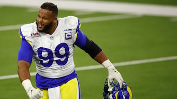 INGLEWOOD, CALIFORNIA - FEBRUARY 13: Aaron Donald #99 of the Los Angeles Rams reacts after a sack on Joe Burrow #9 of the Cincinnati Bengals during Super Bowl LVI at SoFi Stadium on February 13, 2022 in Inglewood, California.   Ronald Martinez/Getty Images/AFP
== FOR NEWSPAPERS, INTERNET, TELCOS & TELEVISION USE ONLY ==