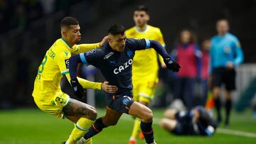 Soccer Football - Ligue 1 - Nantes v Olympique de Marseille - The Stade de la Beaujoire - Louis Fonteneau, Nantes, France - February 1, 2023 Nantes' Joao Victor in action with Olympique de Marseille's Alexis Sanchez REUTERS/Stephane Mahe