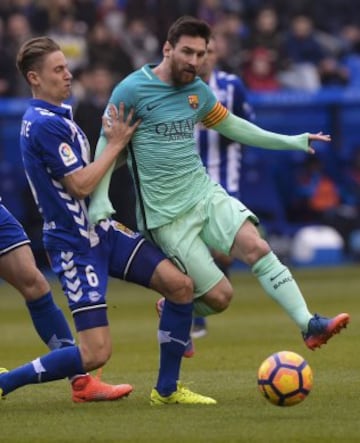 Messi y Marcos Llorente.