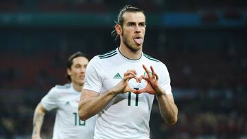 NANNING, CHINA - MARCH 22: Gareth Bale #11 of Wales celebrates after scoring his team's first goal during the 2018 China Cup International Football Championship match between China and Wales at Guangxi Sports Center on March 22, 2018 in Nanning, Chi