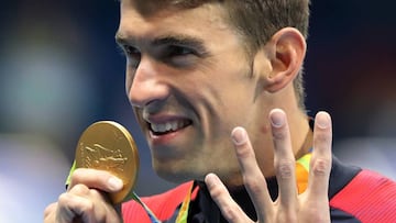 FILE - In this Aug. 11, 2016 file photo, United States' Michael Phelps celebrates winning the gold medal in the men's 200-meter individual medley during the swimming competitions at the 2016 Summer Olympics, in Rio de Janeiro, Brazil. (AP Photo/Lee Jin-man, File)