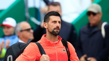 Tennis - ATP Masters 1000 - Monte Carlo Masters - Monte Carlo Country Club, Roquebrune-Cap-Martin, France - April 9, 2025 Serbia's Novak Djokovic walks into the court ahead of his round of 32 match against Chile's Alejandro Tabilo REUTERS/Manon Cruz