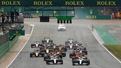 Formula One F1 - British Grand Prix - Silverstone Circuit, Silverstone, Britain - July 14, 2019 Mercedes' Valtteri Bottas and Mercedes' Lewis Hamilton in action at the start of the race REUTERS/John Sibley