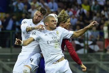 Ramos, Pepe y Torres. 