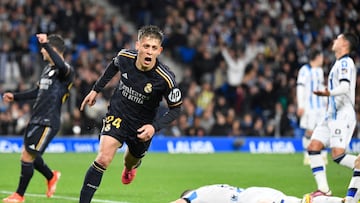 Real Madrid's Turkish midfielder #24 Arda Guler celebrates scoring his team's first goal during the Spanish league football match between Real Sociedad and Real Real Madrid CF at the Anoeta stadium in San Sebastian on April 26, 2024. (Photo by Ander Gillenea / AFP)