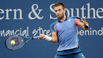 MASON, OHIO - AUGUST 20: Borna Coric of Crotia returns a shot to Cameron Norrie of Great Britain during the semifinals of the Western & Southern Open at Lindner Family Tennis Center on August 20, 2022 in Mason, Ohio.