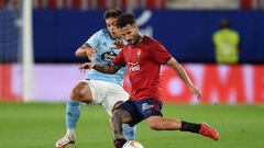 PAMPLONA, SPAIN - AUGUST 23: Ruben Garcia of Osasuna and Fran Beltran of Celta Vigo  battle for the ball  during the LaLiga Santander match between CA Osasuna and RC Celta de Vigo at Estadio El Sadar on August 23, 2021 in Pamplona, Spain. (Photo by Juan M