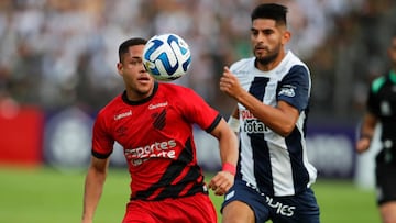 LIMA, PERU - APRIL 04: Roque Ferreira of Athletico Paranaense runs for the ball challenged by Carlos Zambrano of Alianza Lima during a Copa CONMEBOL Libertadores group G match between Alianza Lima and Athletico Paranaense at Estadio Alejandro Villanueva on April 4, 2023 in Lima, Peru. (Photo by Daniel Apuy/Getty Images)