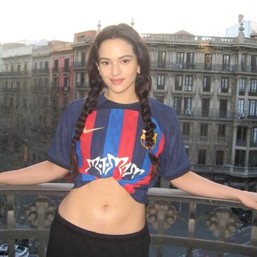 What is the white heart on Barcelona’s jersey and who is Karol G?