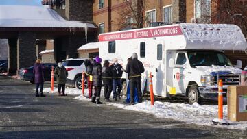 Support workers for the Iditarod Trail Sled Dog Race line up outside the Lakefront Anchorage Hotel, the site of the temporary Anchorage Iditarod headquarters, to be tested for coronavirus (COVID-19), in Anchorage, Alaska, U.S., March 4, 2021. The workers 