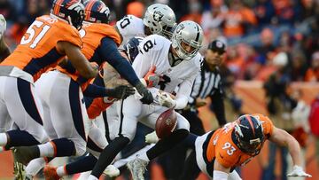 DENVER, CO - JANUARY 1: Outside linebacker Shane Ray #56 of the Denver Broncos sacks quarterback Connor Cook #8 of the Oakland Raiders, who fumbles the ball in the third quarter of the game at Sports Authority Field at Mile High on January 1, 2017 in Denver, Colorado. Dustin Bradford/Getty Images/AFP
== FOR NEWSPAPERS, INTERNET, TELCOS & TELEVISION USE ONLY ==