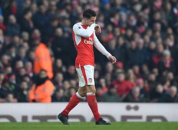 Granit Xhaka of Arsenal walks off the pitch after being shown a red card during the Premier League match between Arsenal and Burnley