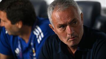 Fenerbahce's Portuguese head coach Jose Mourinho looks on from the bench ahead of the start of the UEFA Champions League play off first leg football match between Fenerbahce (TUR) and Benfica (POR) at the Fenerbahce Sukru Saracoglu Sport Complex in Istanbul on August 20, 2025. (Photo by Ozan KOSE / AFP)