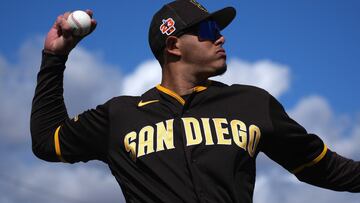 Feb 26, 2023; Peoria, Arizona, USA; San Diego Padres third baseman Manny Machado (13) warms up prior to facing the Arizona Diamondbacks at Peoria Sports Complex. Mandatory Credit: Joe Camporeale-USA TODAY Sports