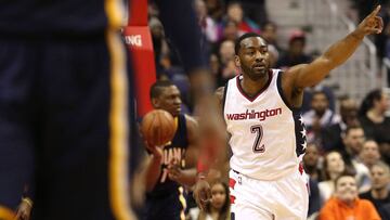 WASHINGTON, DC - FEBRUARY 10: John Wall #2 of the Washington Wizards reacts after making a basket against the Indiana Pacers during the first half at Verizon Center on February 10, 2017 in Washington, DC. NOTE TO USER: User expressly acknowledges and agrees that, by downloading and or using this photograph, User is consenting to the terms and conditions of the Getty Images License Agreement. Patrick Smith/Getty Images/AFP
== FOR NEWSPAPERS, INTERNET, TELCOS & TELEVISION USE ONLY ==