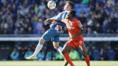 BARCELONA, SPAIN - NOVEMBER 24: Victor Campuzano of RCD Espanyol is challenged by Djene Dakonam of Getafe CF during the Liga match between RCD Espanyol and Getafe CF at RCDE Stadium on November 24, 2019 in Barcelona, Spain. (Photo by Eric Alonso/Getty Ima