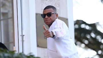 France's forward #10 Kylian Mbappe gives the thumb-up as he arrives at the Centre National du Football in Clairefontaine-en-Yvelines, southwest of Paris, on March 17, 2025, to take part in the team's training camp for the upcoming UEFA Nations League quarter-final matches against Croatia. (Photo by FRANCK FIFE / AFP)
