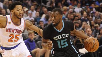 Nov 26, 2016; Charlotte, NC, USA;  Charlotte Hornets guard Kemba Walker (15) drives past New York Knicks guard Derrick Rose (25) during the second half of the game at the Spectrum Center. Hornets win 107-102. Mandatory Credit: Sam Sharpe-USA TODAY Sports