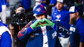 TORONTO, CANADA - MARCH 29: George Springer #4 of the Toronto Blue Jays celebrates in the dugout after hitting a solo-home run in the first inning of their MLB game against the Athletics at Rogers Centre on March 29, 2026 in Toronto, Ontario, Canada. Cole Burston/Getty Images/AFP (Photo by Cole Burston / GETTY IMAGES NORTH AMERICA / Getty Images via AFP)