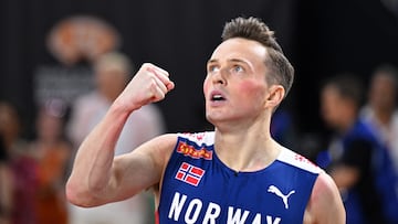 Norway's Karsten Warholm celebrates after winning the men's 400m hurdles final during the World Athletics Championships at the National Athletics Centre in Budapest on August 23, 2023. (Photo by Kirill KUDRYAVTSEV / AFP)