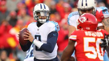 Jan 6, 2018; Kansas City, MO, USA; Tennessee Titans quarterback Marcus Mariota (8) drops back to pass against the Kansas City Chiefs during the first quarter in the AFC Wild Card playoff football game at Arrowhead Stadium. Mandatory Credit: Jay Biggerstaf
