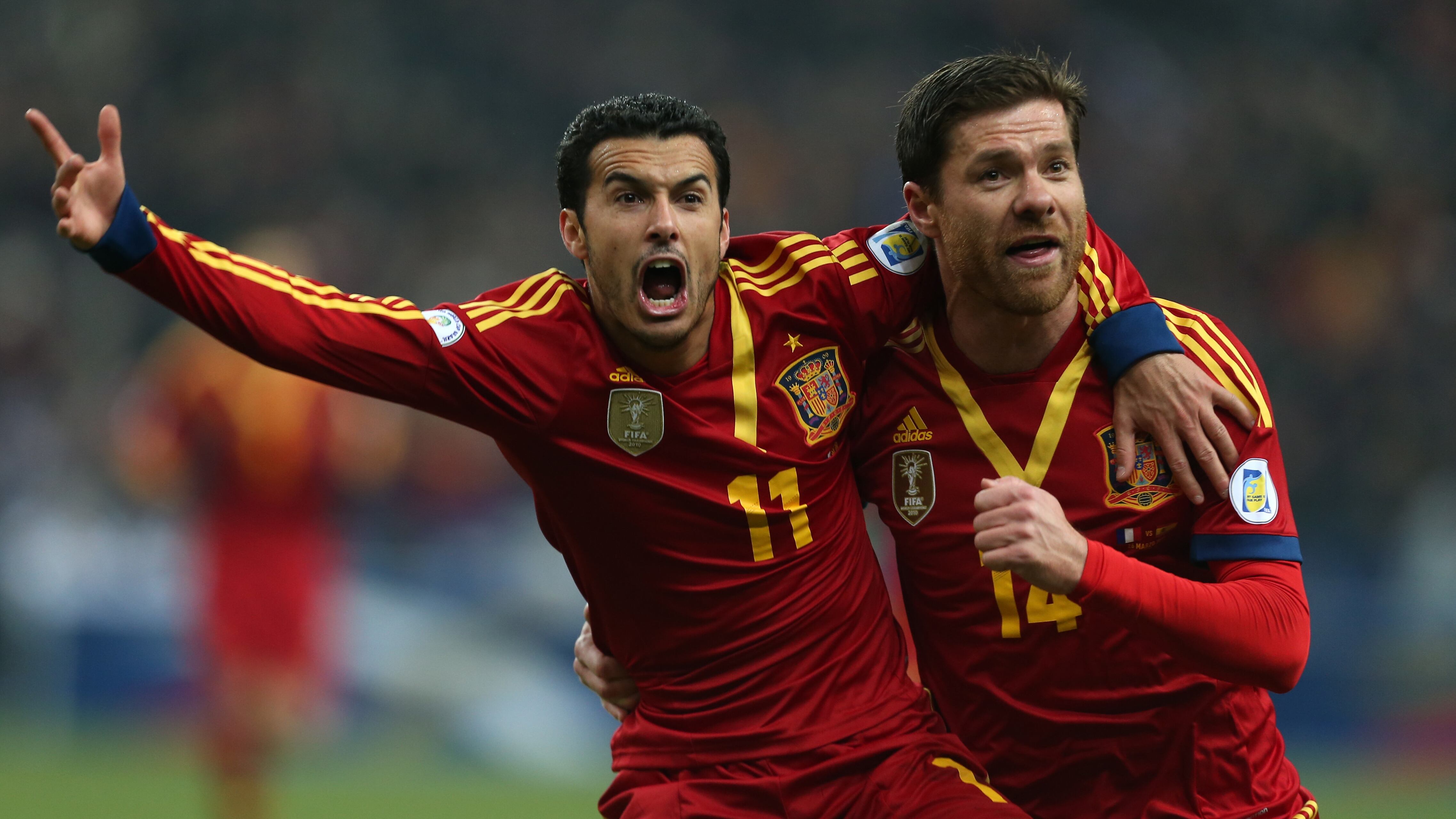 El algodón de España, Rodrigue, celebra con el chafi Alonso de España después de anotar 0-1 (foto de Ama/Corbis a través de Getty Images)