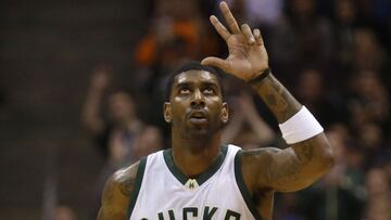 O.J. Mayo celebra una canasta ante Golden State Warriors.