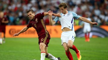 MARSEILLE, FRANCE - JUNE 11:  Aleksandr Kokorin of Russia holds off Eric Dier of England during the UEFA EURO 2016 Group B match between England and Russia at Stade Velodrome on June 11, 2016 in Marseille, France.  (Photo by Alex Livesey/Getty Images)