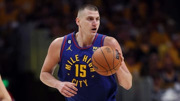 DENVER, COLORADO - JUNE 01: Nikola Jokic #15 of the Denver Nuggets dribbles the ball during the second quarter against the Miami Heat in Game One of the 2023 NBA Finals at Ball Arena on June 01, 2023 in Denver, Colorado. NOTE TO USER: User expressly acknowledges and agrees that, by downloading and or using this photograph, User is consenting to the terms and conditions of the Getty Images License Agreement. Matthew Stockman/Getty Images/AFP (Photo by MATTHEW STOCKMAN / GETTY IMAGES NORTH AMERICA / Getty Images via AFP)