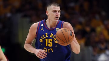 DENVER, COLORADO - JUNE 01: Nikola Jokic #15 of the Denver Nuggets dribbles the ball during the second quarter against the Miami Heat in Game One of the 2023 NBA Finals at Ball Arena on June 01, 2023 in Denver, Colorado. NOTE TO USER: User expressly acknowledges and agrees that, by downloading and or using this photograph, User is consenting to the terms and conditions of the Getty Images License Agreement.   Matthew Stockman/Getty Images/AFP (Photo by MATTHEW STOCKMAN / GETTY IMAGES NORTH AMERICA / Getty Images via AFP)