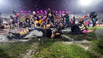 Appalachian State Mountaineers tight end Max Drag (80) and safety Dyvon McKinney (31) celebrate