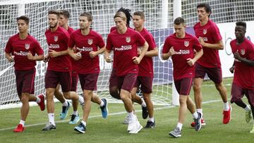 Los jugadores del Atlético durante el entrenamiento.
