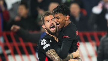 Barcelona's Spanish defender #05 Inigo Martinez Berridi (L) celebrates after scoring a goal with Barcelona's Spanish forward #19 Lamine Yamal during the UEFA Champions League, League phase - Matchday 4 football match between Crvena Zvezda Beograd and FC Barcelona, at the Rajko-Mitic Stadium, in Belgrade, on November 6, 2024. (Photo by Pedja Milosavljevic / AFP)