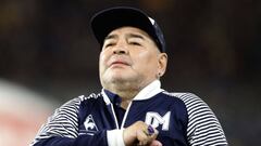 Argentine former football star Diego Maradona acknowledges spectators during an homage before the start of the Argentina First Division 2020 Superliga Tournament football match Boca Juniors vs Gimnasia La Plata, at La Bombonera stadium, in Buenos Aires, on March 7, 2020. (Photo by ALEJANDRO PAGNI / AFP)