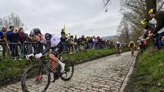 (From L) Slovenian Tadej Pogacar of UAE Team Emirates, Dutch Mathieu van der Poel of Alpecin-Deceuninck and Belgian Tiesj Benoot of Jumbo-Visma compete during the men's Tour of Flanders one day cycling event, 273,4km from Bruges to Oudenaarde, on April 2, 2023. (Photo by DIRK WAEM / Belga / AFP) / Belgium OUT