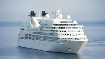 A 77-year-old woman fulfills her dream of traveling the world by purchasing a cabin aboard a residential cruise ship, joining hundreds living full-time at sea.