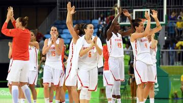 (From 2nd L) Spain's guard Anna Cruz, Spain's point guard Silvia Dominguez, Spain's power forward Astou Ndour and Spain's power forward Laura Nicholls acknowledge the public after a Women's round Group B basketball match between Spain and Canada at the Youth Arena in Rio de Janeiro on August 14, 2016 during the Rio 2016 Olympic Games. / AFP PHOTO / Mark RALSTON