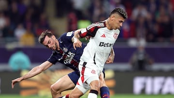 DOHA, QATAR - DECEMBER 17: Jorge Carrascal of CR Flamengo is challenged by Fabian Ruiz of Paris Saint-Germain during the FIFA Intercontinental Cup 2025 final match between Paris Saint-Germain and CR Flamengo at Ahmad Bin Ali Stadium on December 17, 2025 in Doha, Qatar. (Photo by Mohamed Farag - FIFA/FIFA via Getty Images)