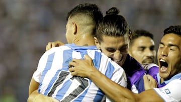 Leonardo Heredia (L) of Argentina&#039;s Atletico Tucuman celebrates with teammates after scoring against Bolivia&#039;s The Strongest during a Copa Libertadores football match at Jose Fierro Stadium in Tucuman, Argentina, on February 12, 2020. (Photo by 