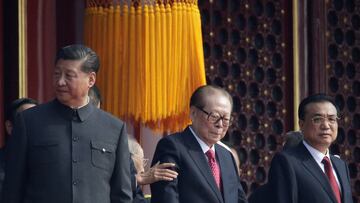 FILE PHOTO: Chinese President Xi Jinping stands next to former president Jiang Zemin and Premier Li Keqiang on Tiananmen Gate before the military parade marking the 70th founding anniversary of People's Republic of China, on its National Day in Beijing, China October 1, 2019. REUTERS/Jason Lee/File Photo