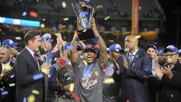 Mar 22, 2017; Los Angeles, CA, USA; USA pitcher Marcus Stroman (6) raises the championship trophy following the 8-0 victory against Puerto Rico in the 2017 World Baseball Classic at Dodger Stadium. Mandatory Credit: Gary A. Vasquez-USA TODAY Sports